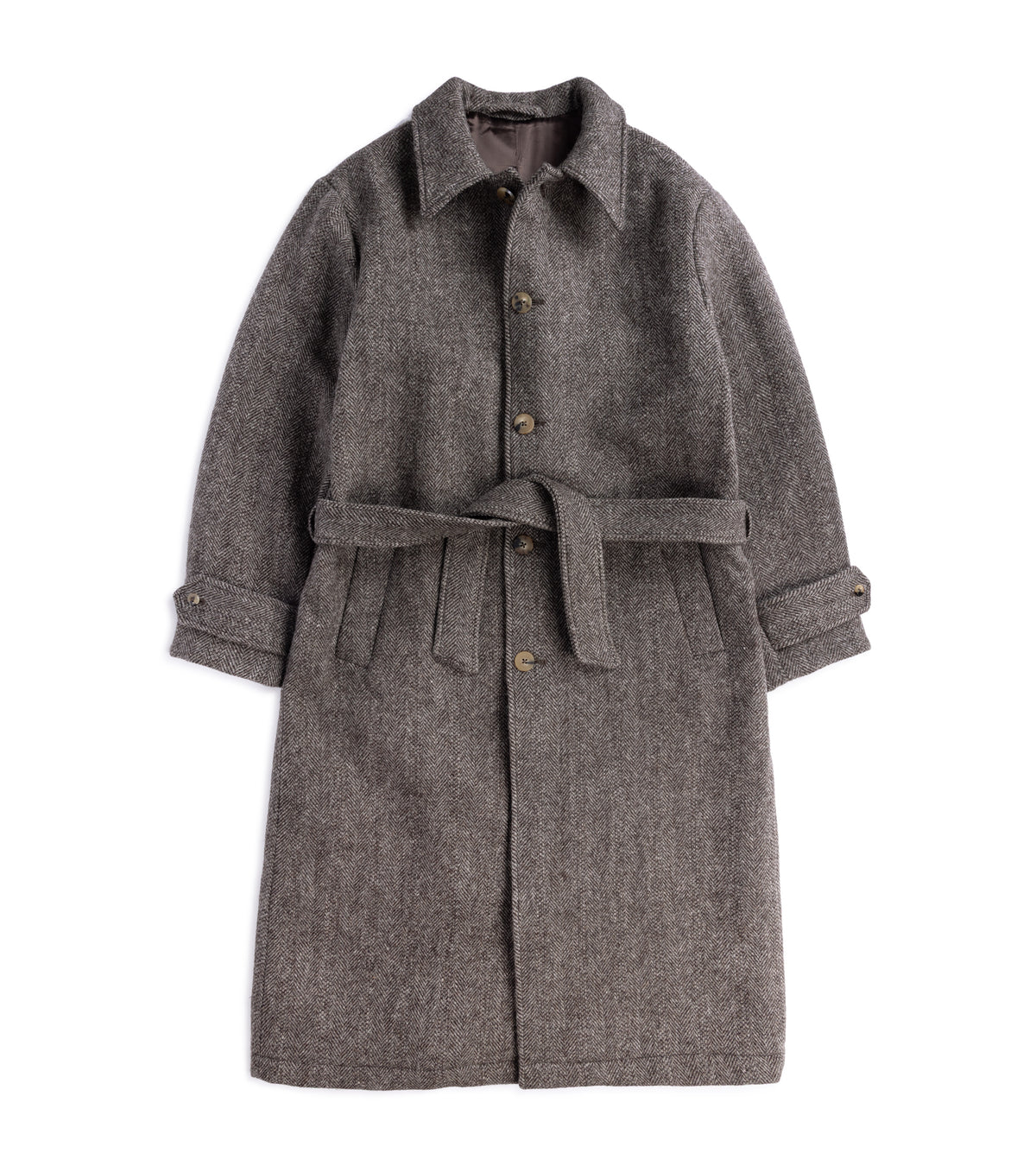 De Bonne Facture Herringbone Wool Overcoat in Undyed Brown with a matching waist tie belt, button front, and collar.