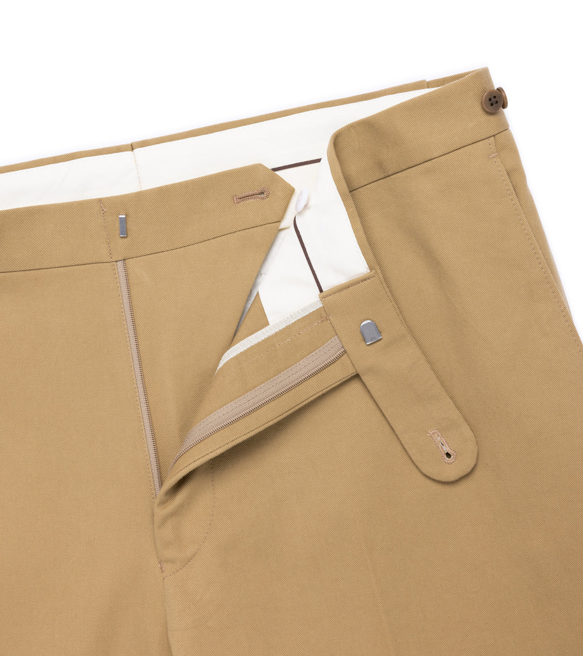 Echizenya Vintage Washed Cotton Tab Chino Trousers in Tan. Close-up detail of the zip. Metal tab and button closure.