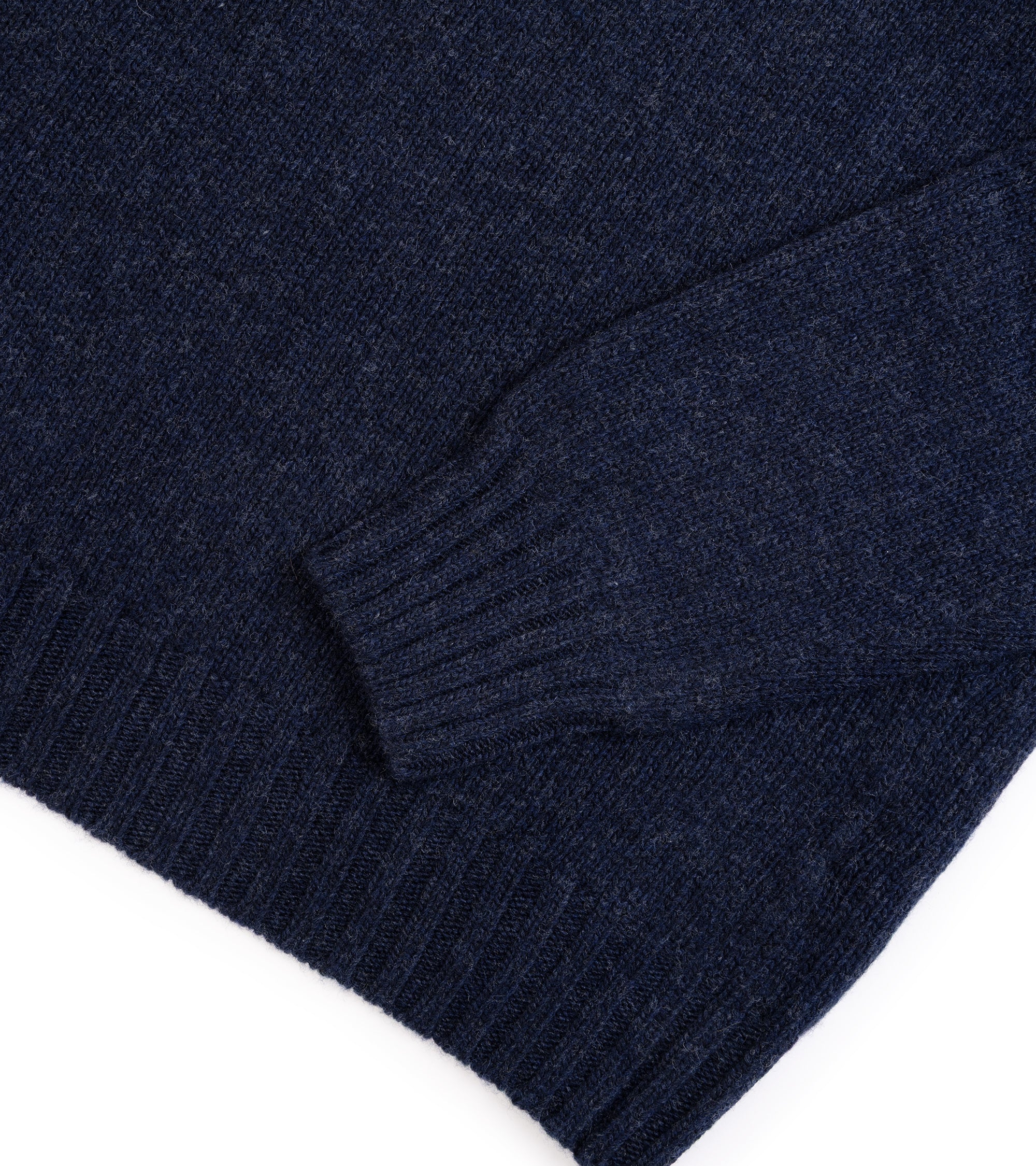 Fedeli Oslo Wool Cashmere Roll Neck Sweater in navy, close-up detail of the ribbed hemmed and sleeve.