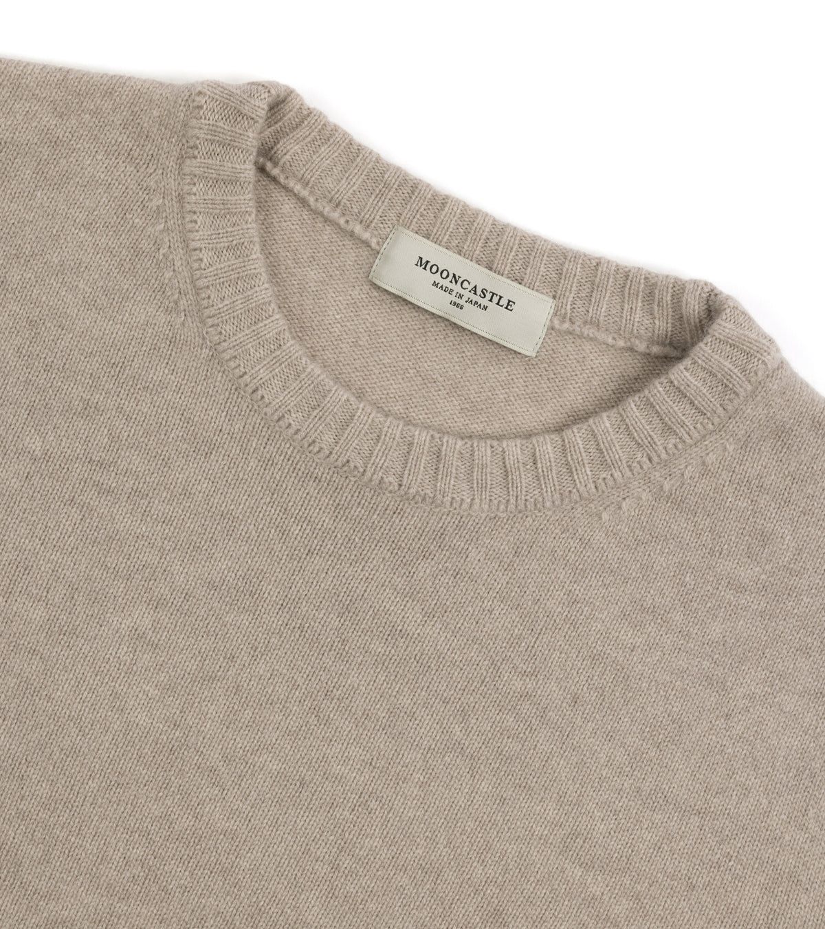 Close up detail of the ribbed crew neck of the Mooncastle Wool Cashmere Silk Crew Neck Sweater in Beige Grey.