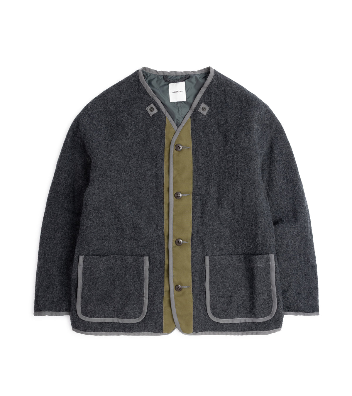 Wool liner in Grey for the Sage de Cret Cotton Nylon Oxford Three-Way Work Jacket in olive. It features a four-button fastening and two front pockets.