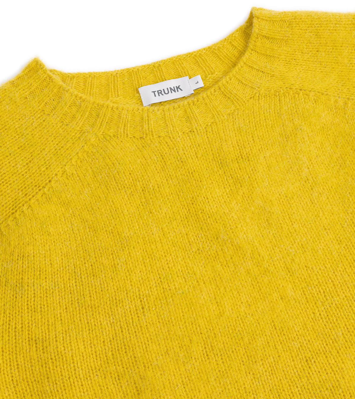 Close-up of the Trunk Goswell Brushed Lambswool Crew Neck Sweater in Citrus, showing the fabric texture and ribbed neck.