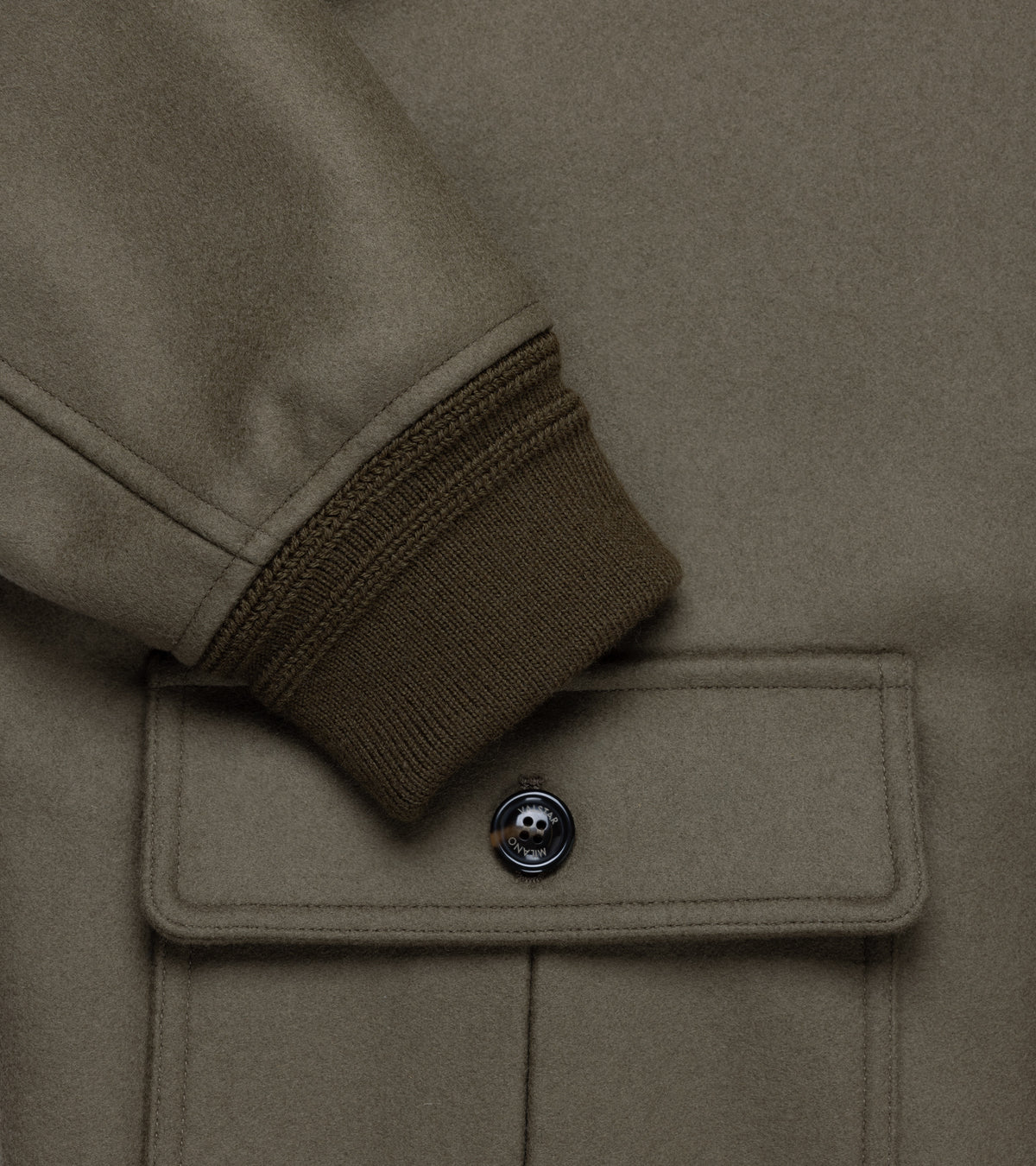 Valstar Valstarino Wool Felt Jacket in Olive. Lose-up detail of the ribbing on the cuff and pocket with Valstar button closure.