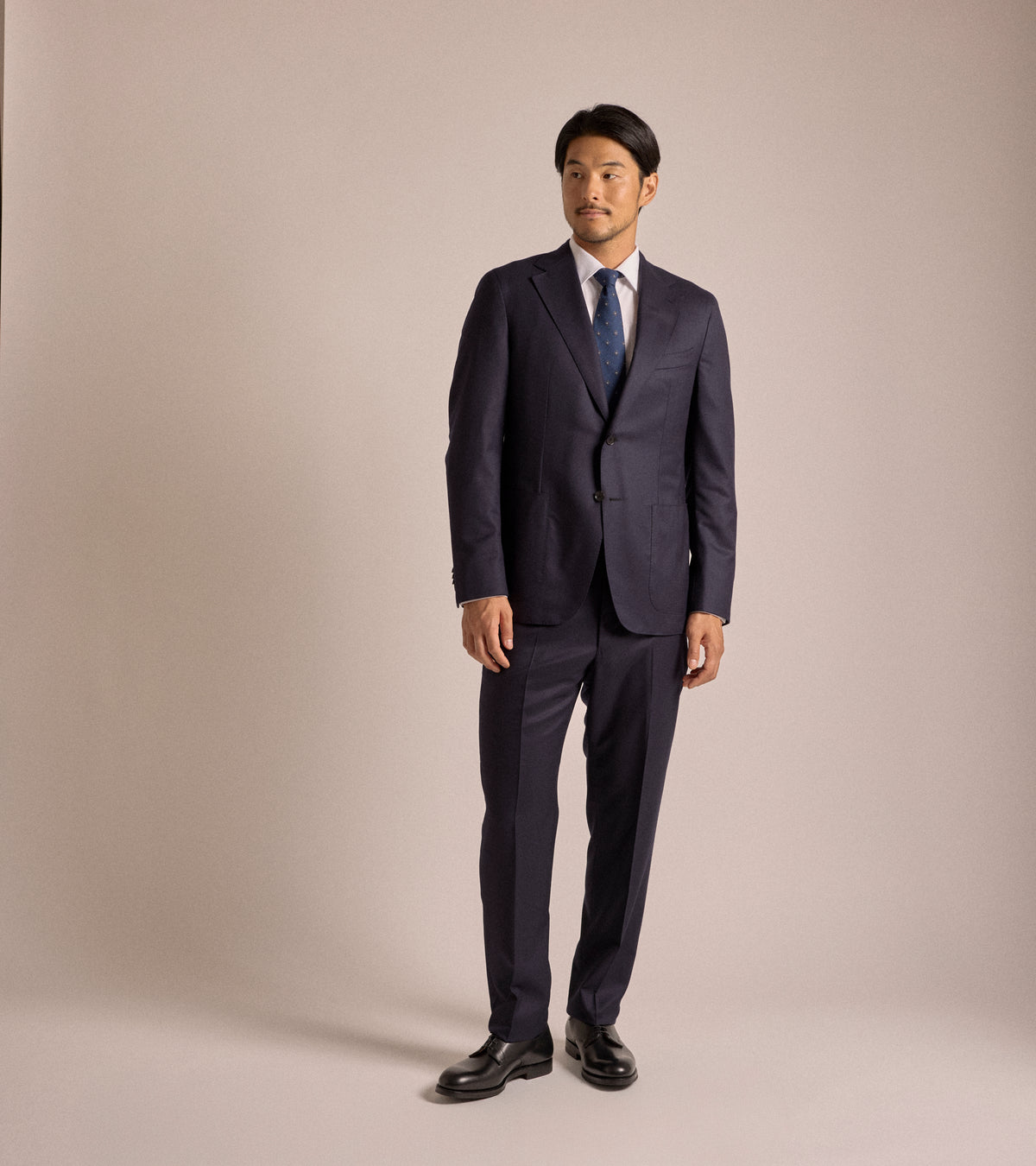 Caruso Superlight Wool Flannel Suit in navy, product photo.