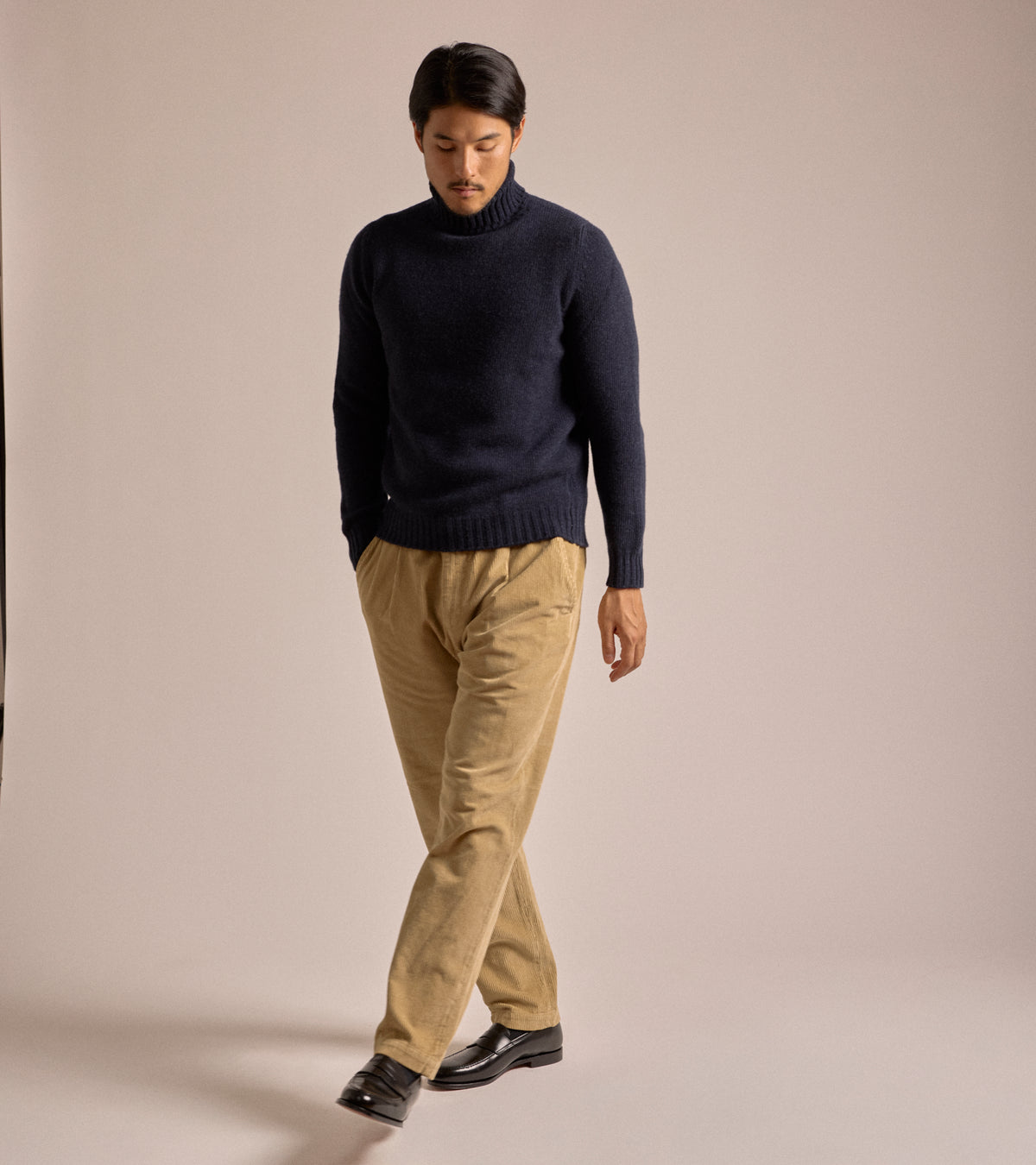 Model wearing the East Harbour Surplus Cord Oxnard Trousers in Fawn.