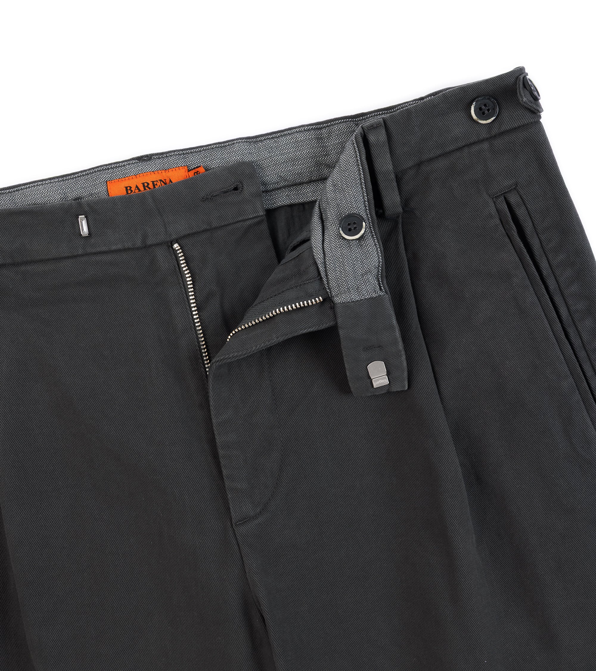 Barena Masco Mante trousers in dark grey. Close-up detail of the zip fly and button and metal tab closure with side adjusters with buttons.