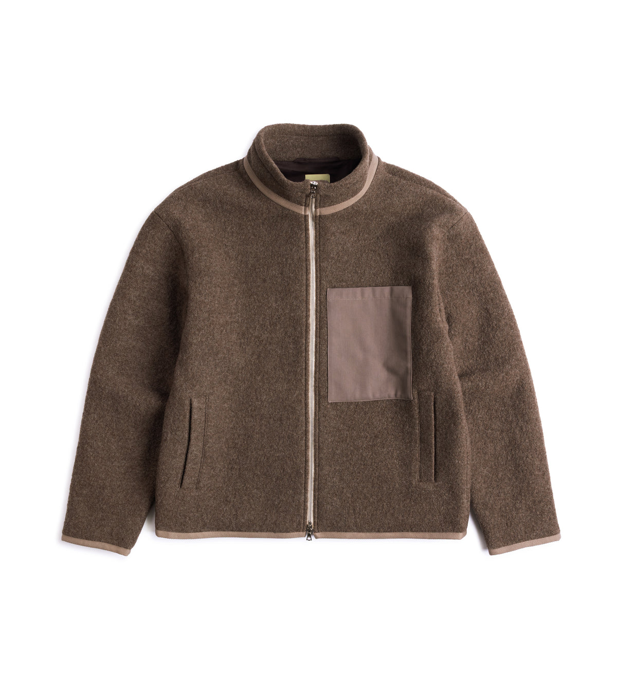 De Bonne Facture Boiled Wool Bookstore Jacket in Ash Brown featuring a stand-up collar, a contrasting solid brown chest pocket and light beige trim along the collar, cuffs, and hem.