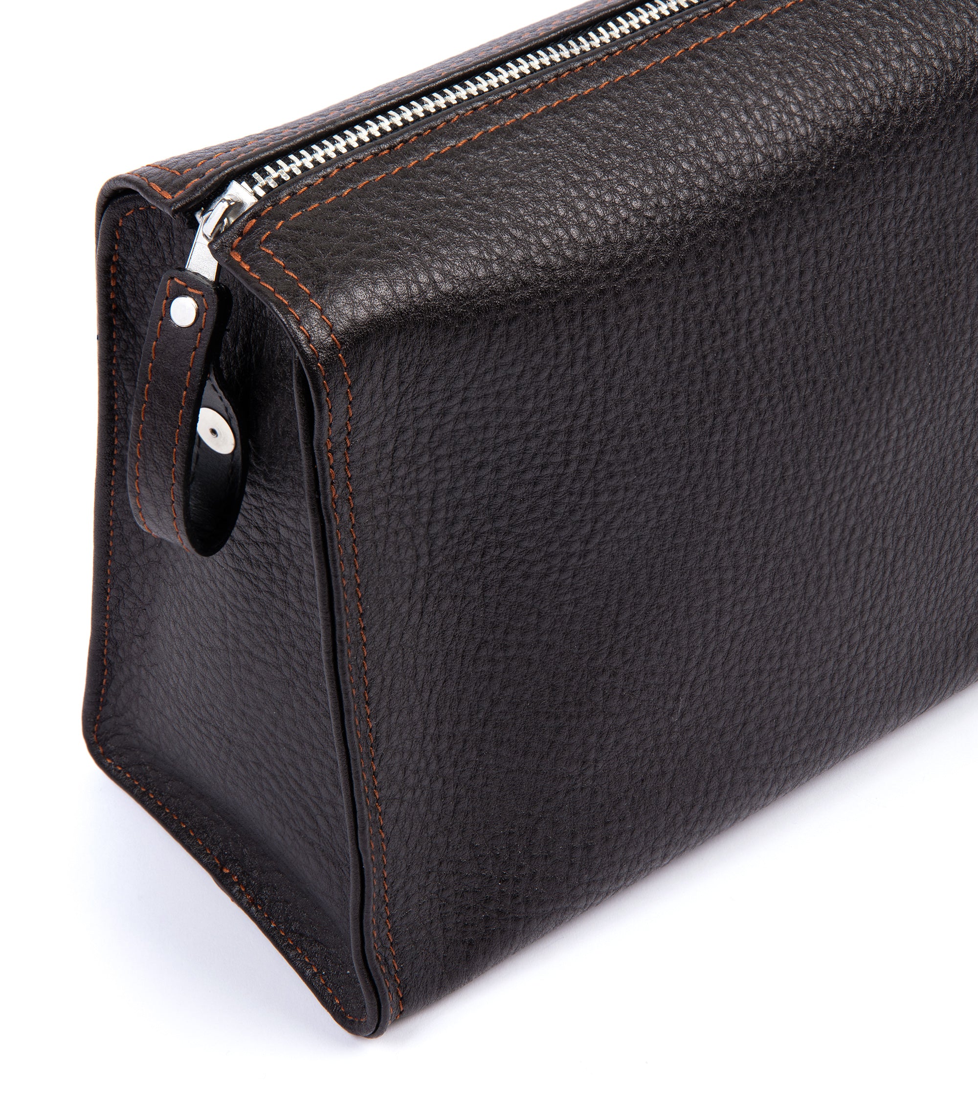 F. Hammann leather wash bag in brown, styled shot.
