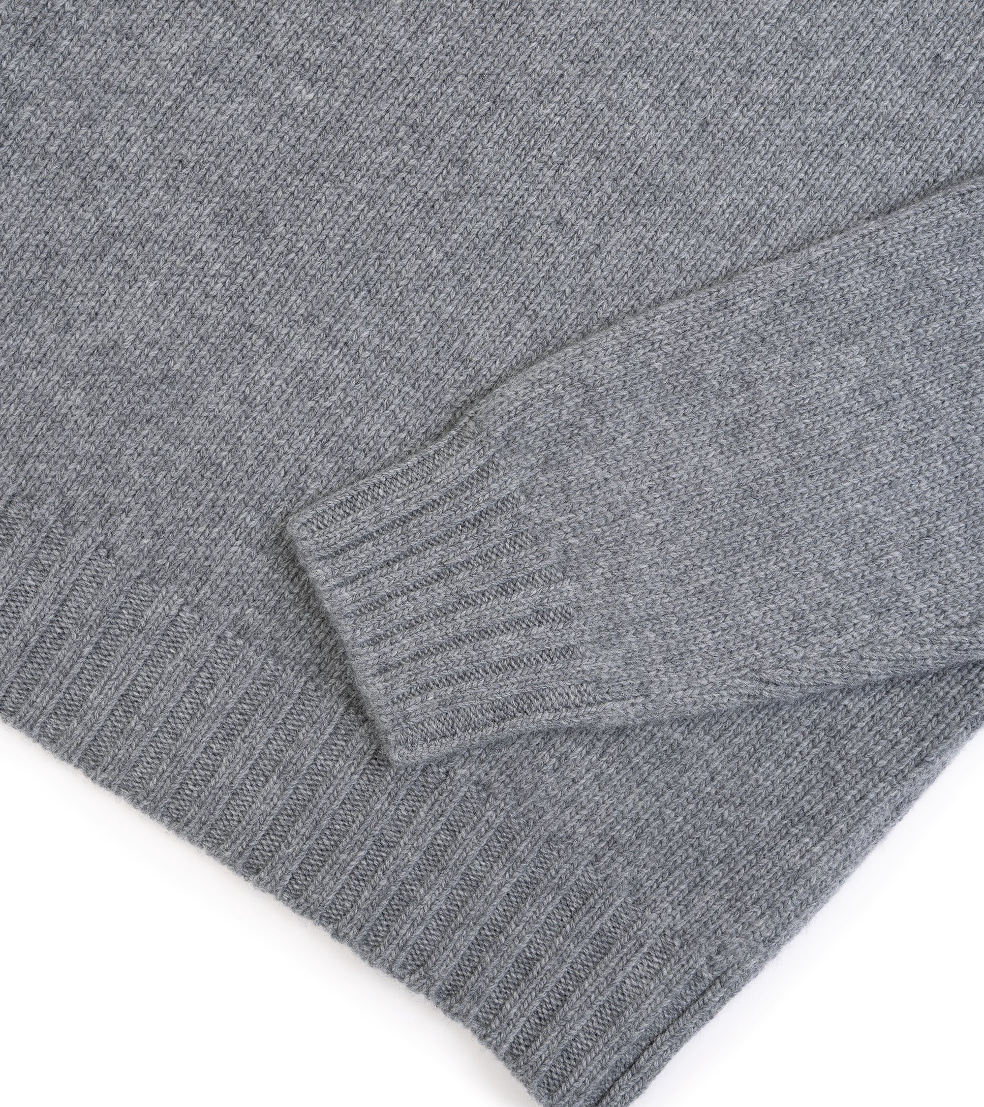 Fedeli Oslo Wool Cashmere Roll Neck Sweater in grey, close-up detail of the ribbed hemmed and sleeve.
