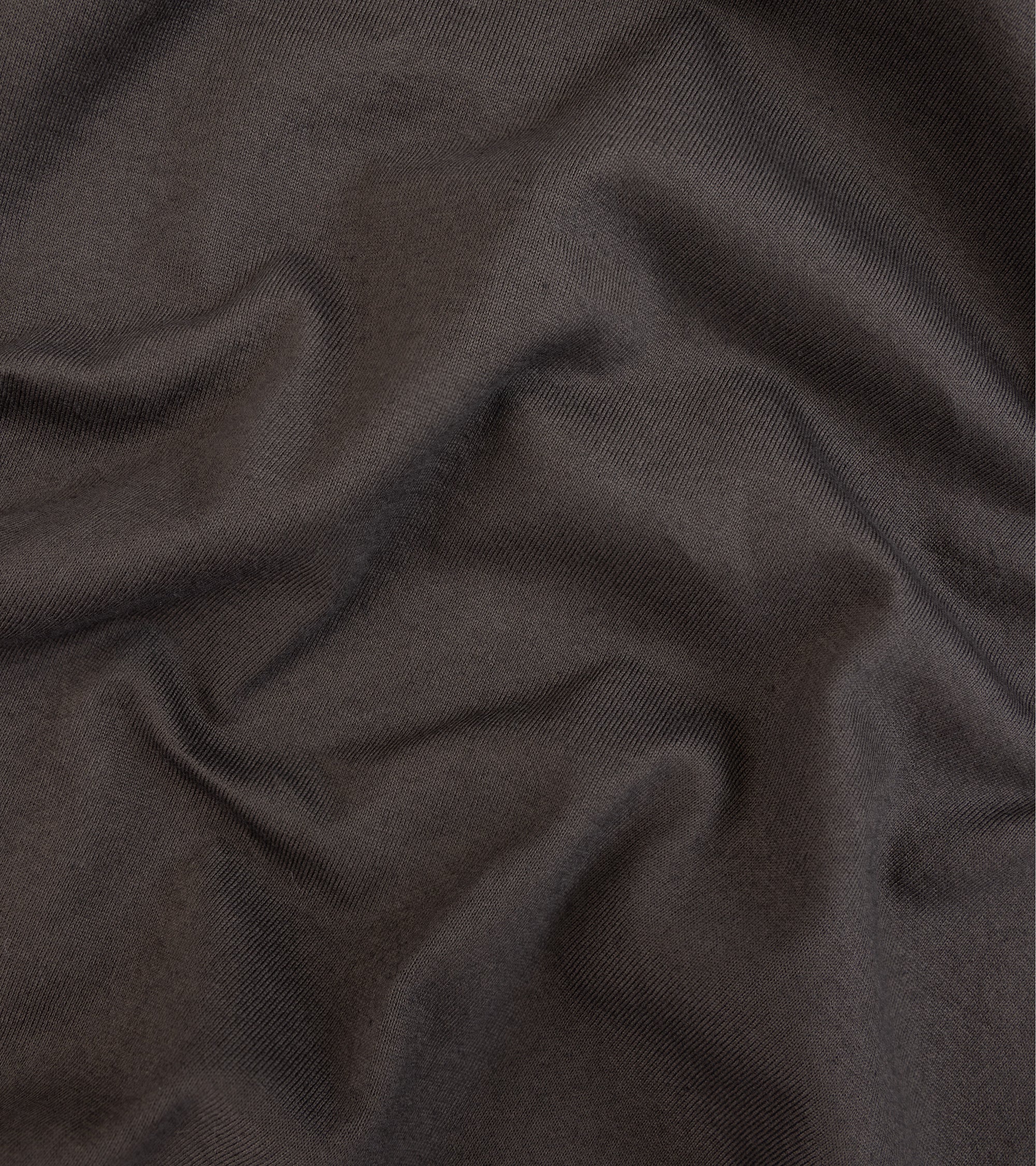 Fedeli Zero Cotton Jersey Long Sleeve Polo Shirt in dark brown. Close-up detail of the organic cotton fabric.