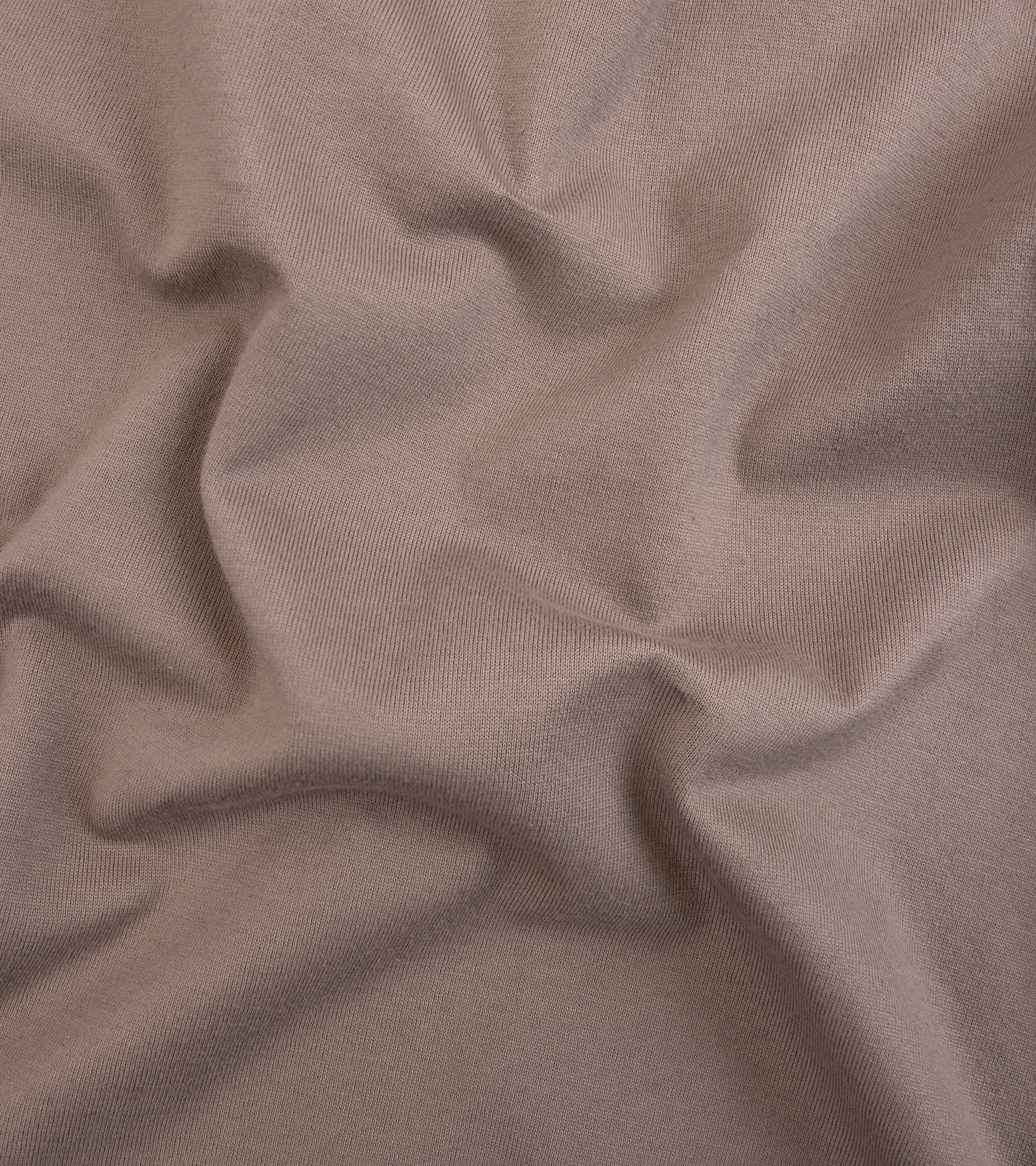 Fedeli Zero Cotton Jersey Long Sleeve Polo Shirt in dark greige. Close-up detail of the organic cotton fabric.