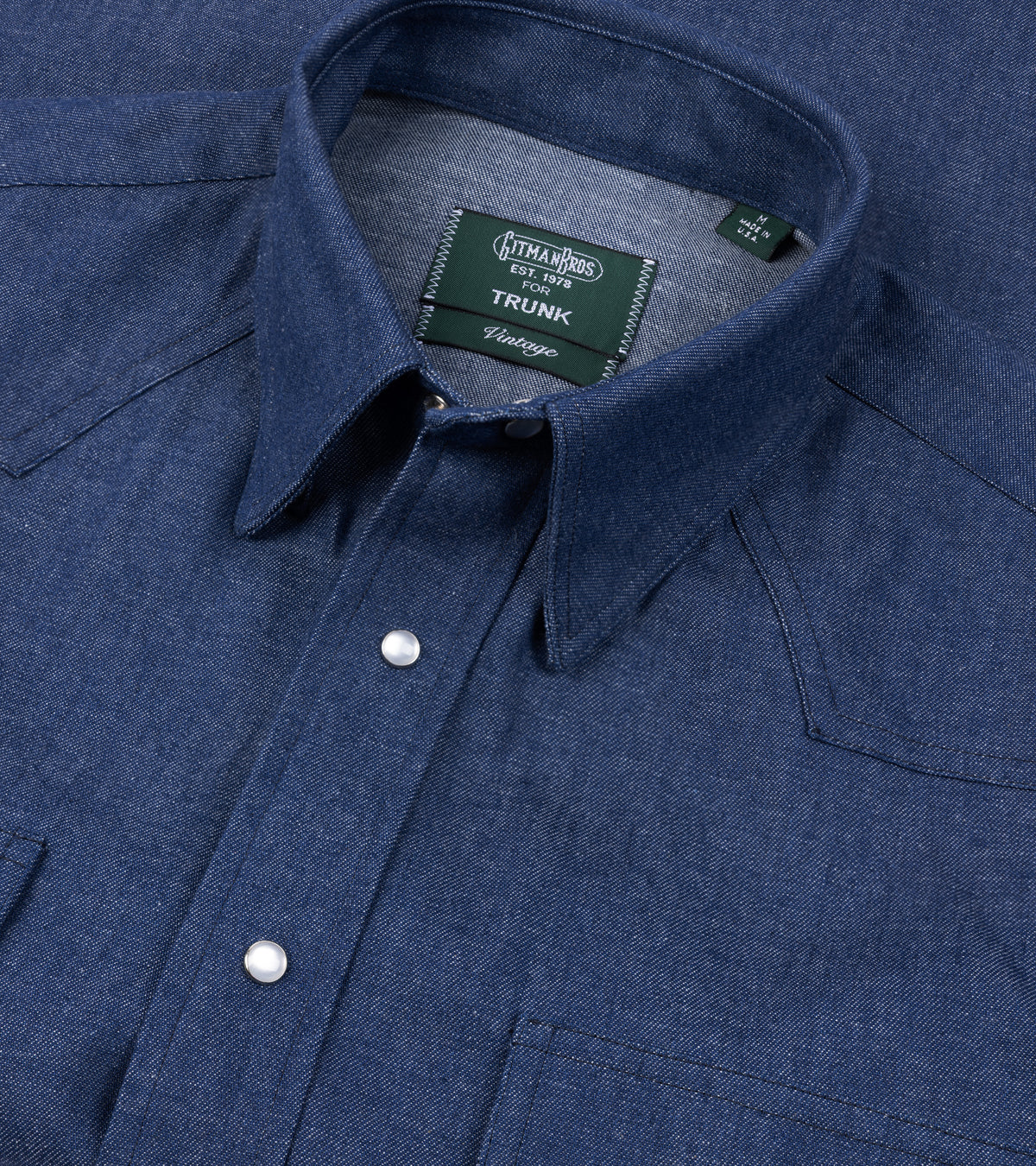 Close-up of the Gitman Vintage Denim Western Shirt in Light Blue, showing the collar and western details.