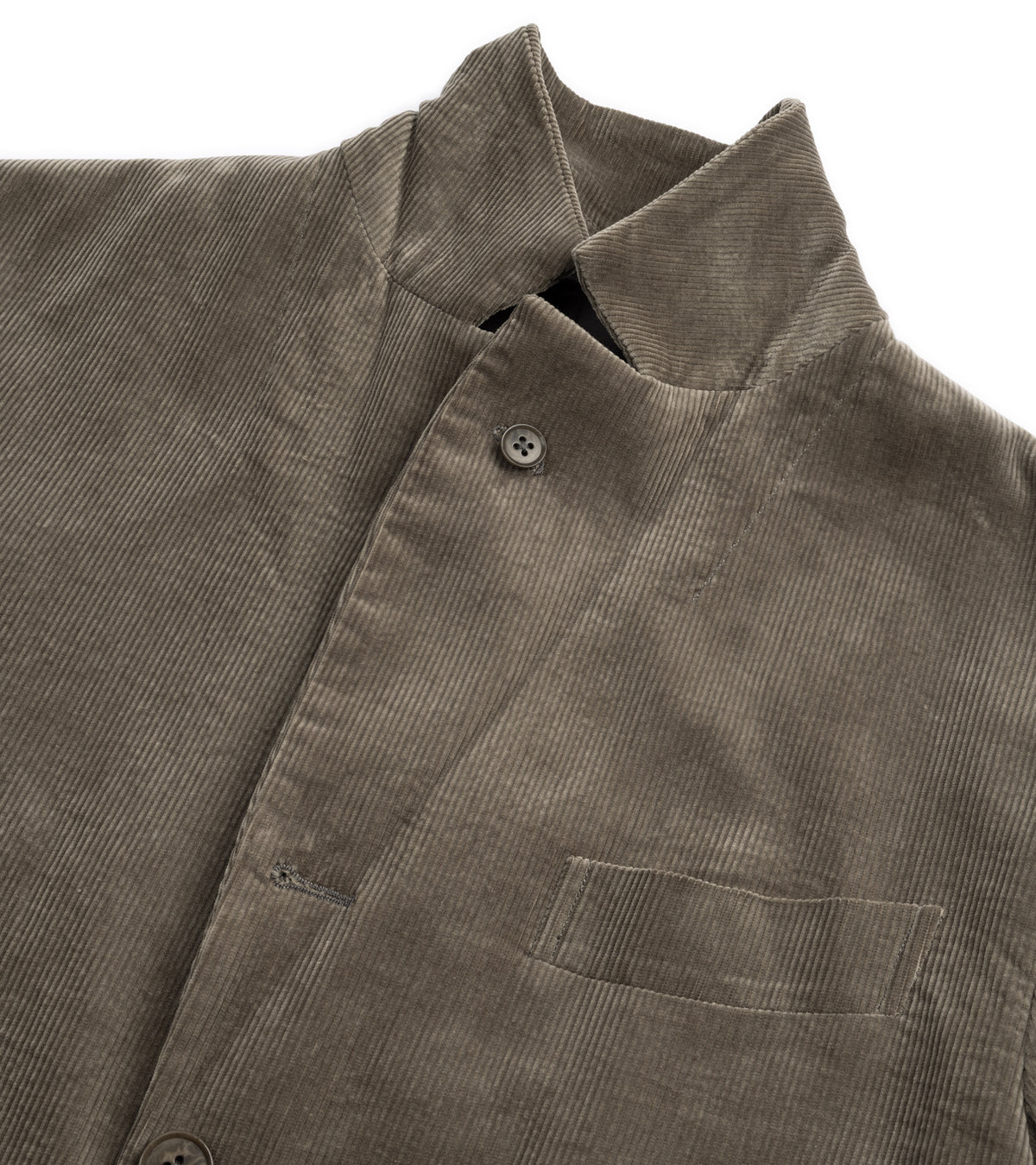 Close-up of the Kaptain Sunshine Cotton Corduroy 4B Jacket in Brown showing the textured fabric, collar, and button closure.