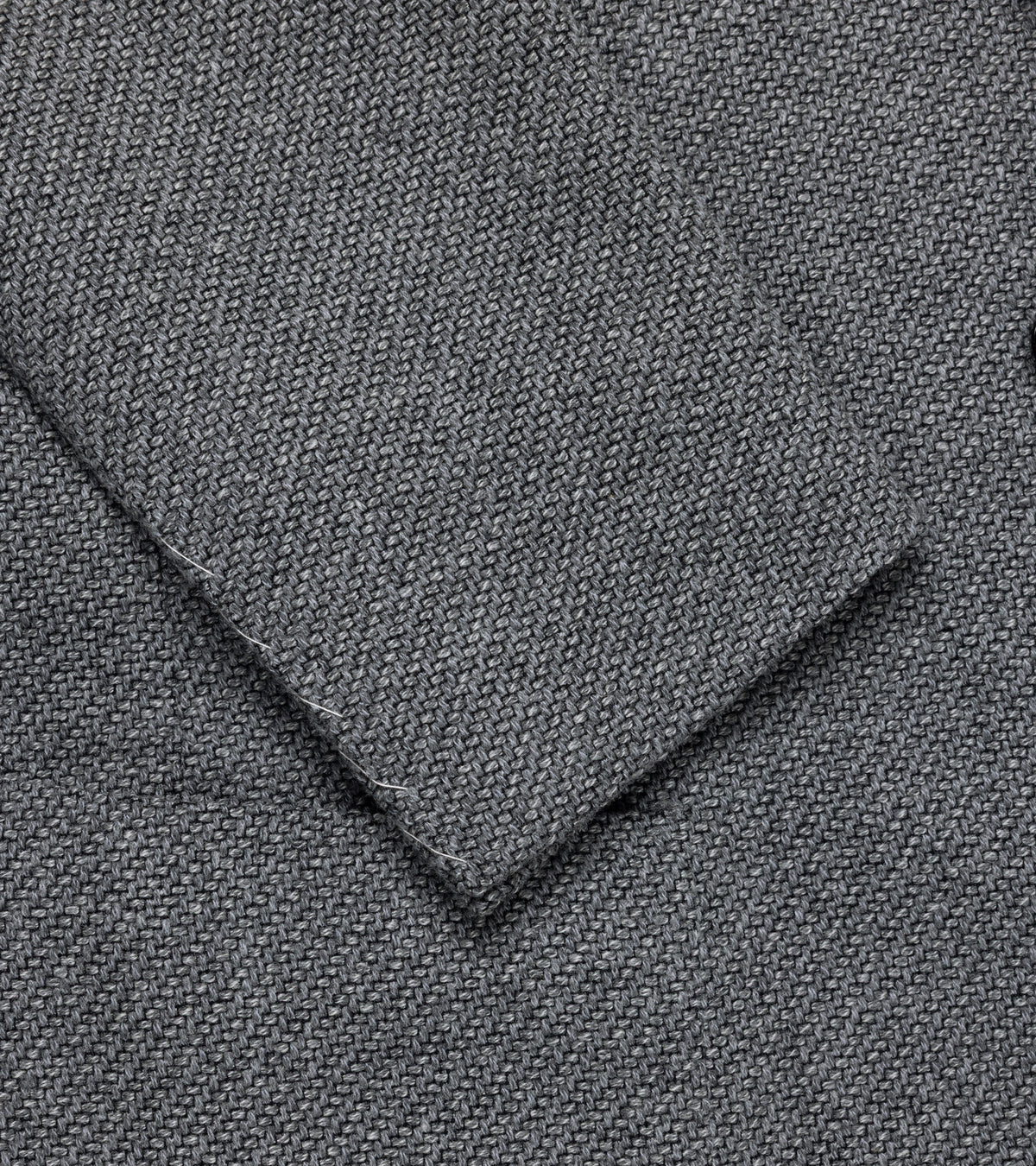 Close-up of the Ring Jacket Meister Wool Roving Kersey Balloon Jacket in Grey showing the texture, weave detail and cuff.