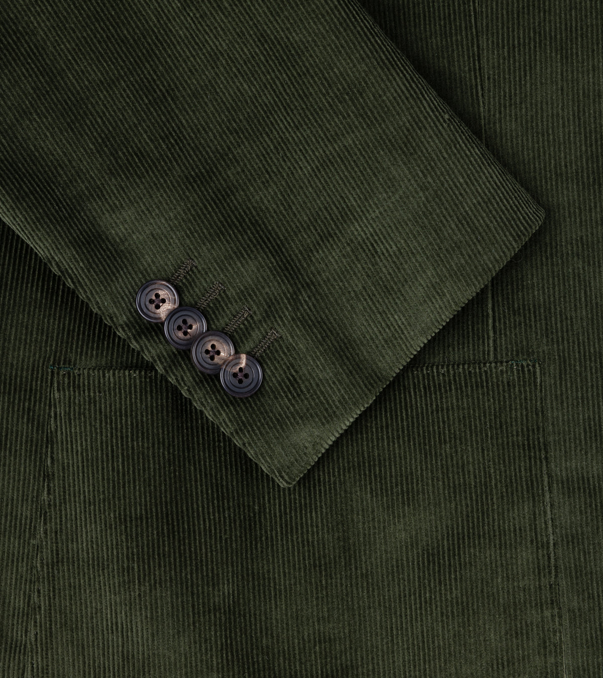 Trunk Hutton Cotton Corduroy Tailored Jacket. Close-up detail of the sleeve, pocket and fabric.