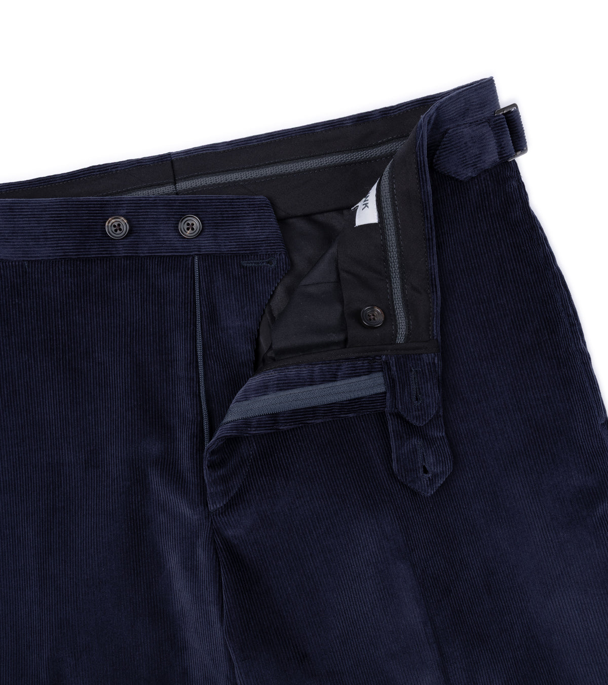 Trunk Hutton Cotton Corduroy Tailored Trousers. Close-up detail of the waist and lining.