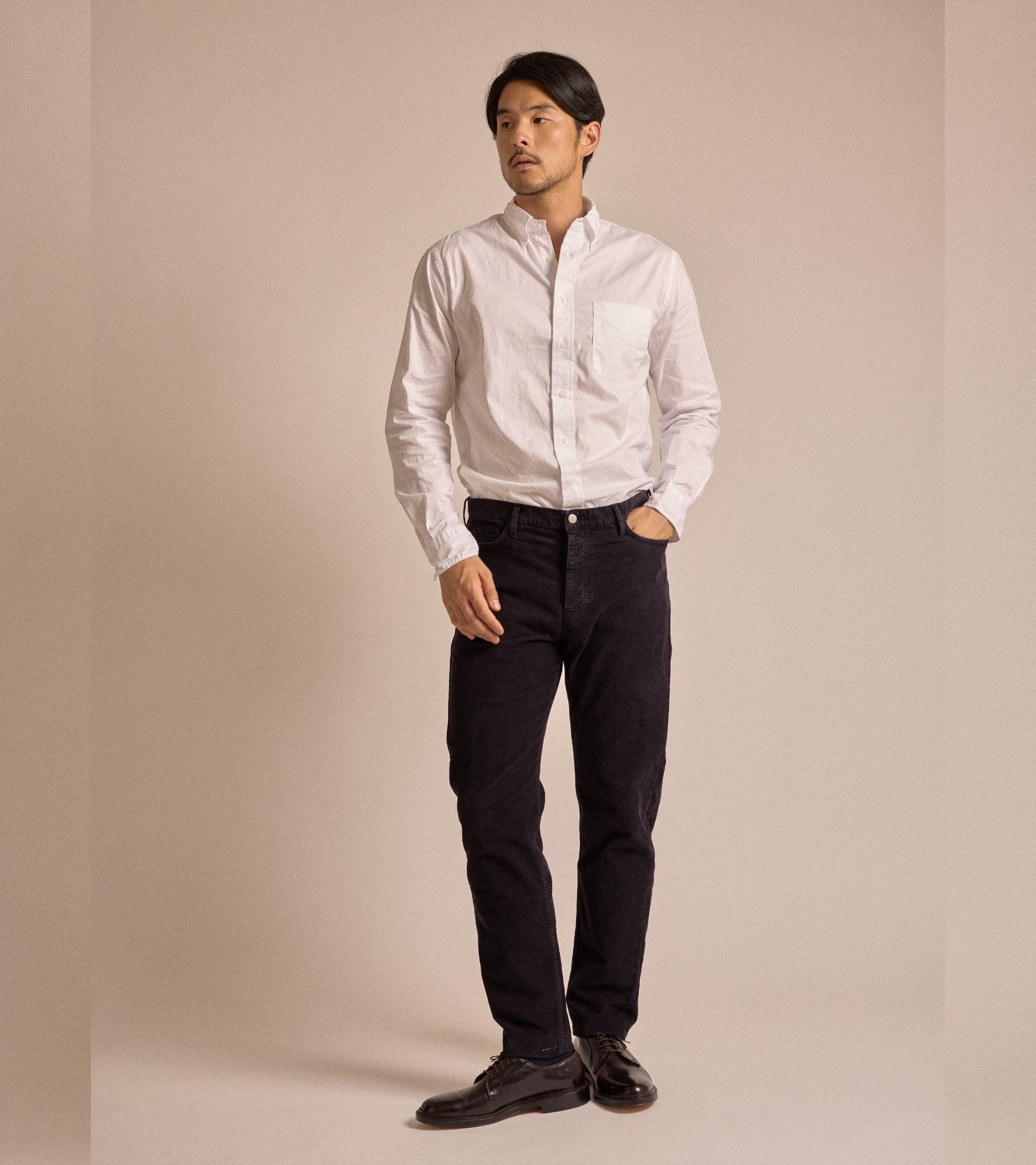 Trunk Dean corduroy 5-pocket trousers in navy, styled shot.