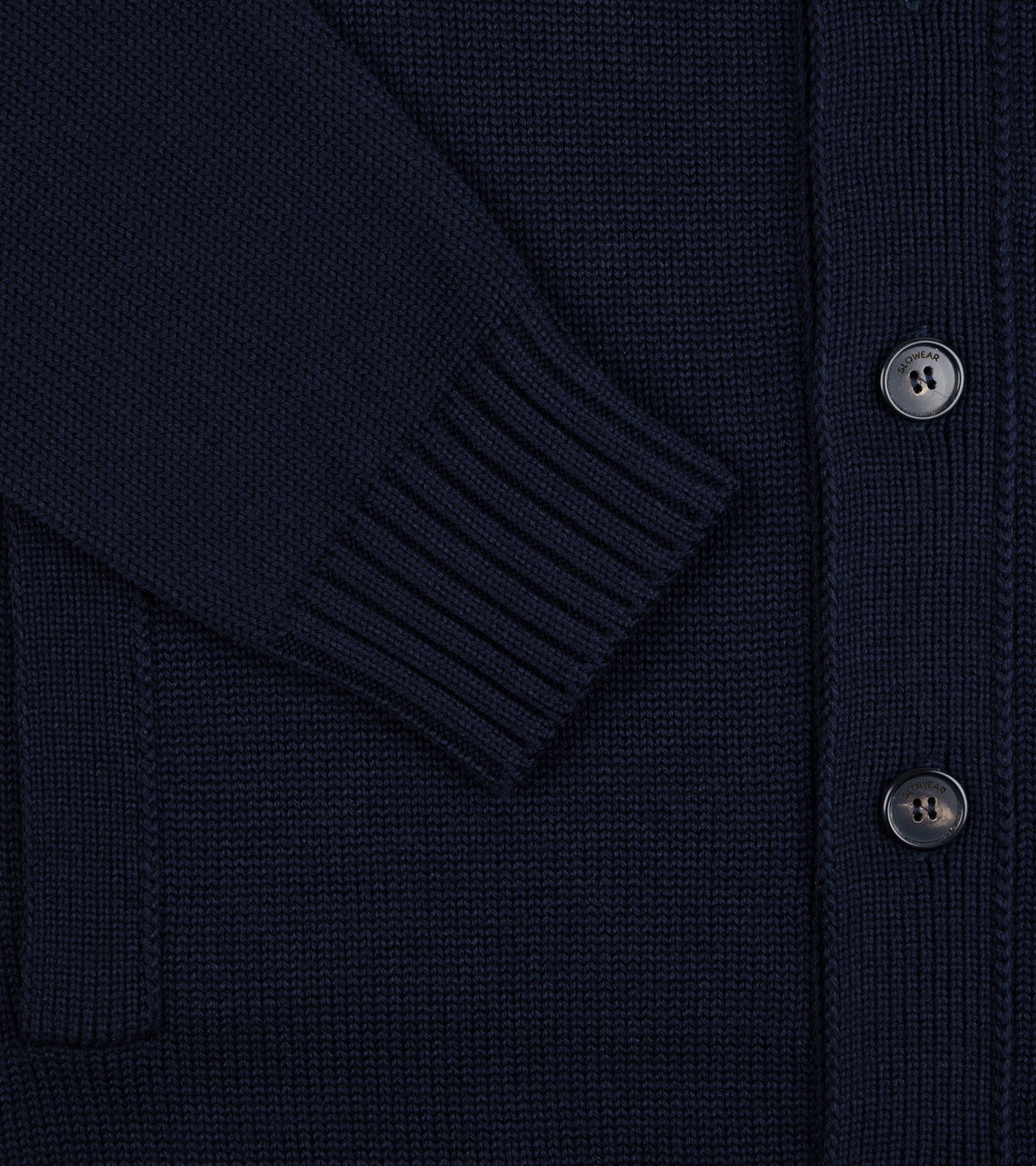 Close-up of the Zanone Chioto 5-Gauge Wool Cardigan in Navy showing the ribbed sleeve cuff, button placket, and pocket details.
