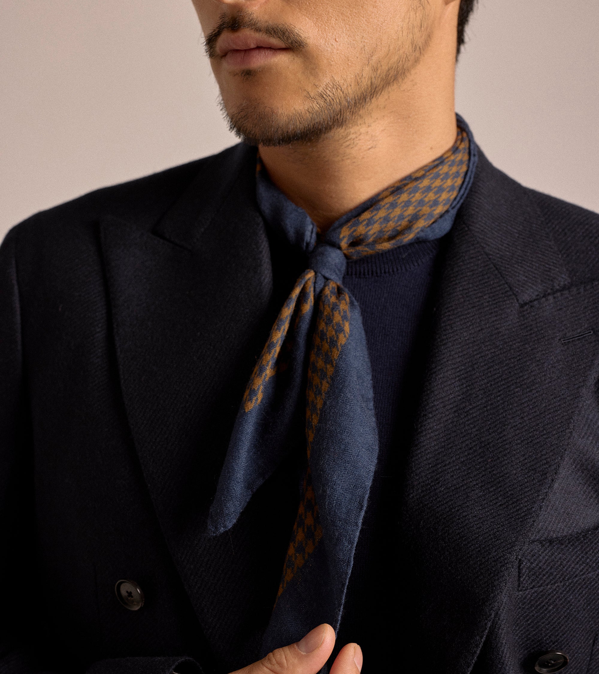 Bigi Wool Houndstooth Bandana in blue and yellow, product photo.