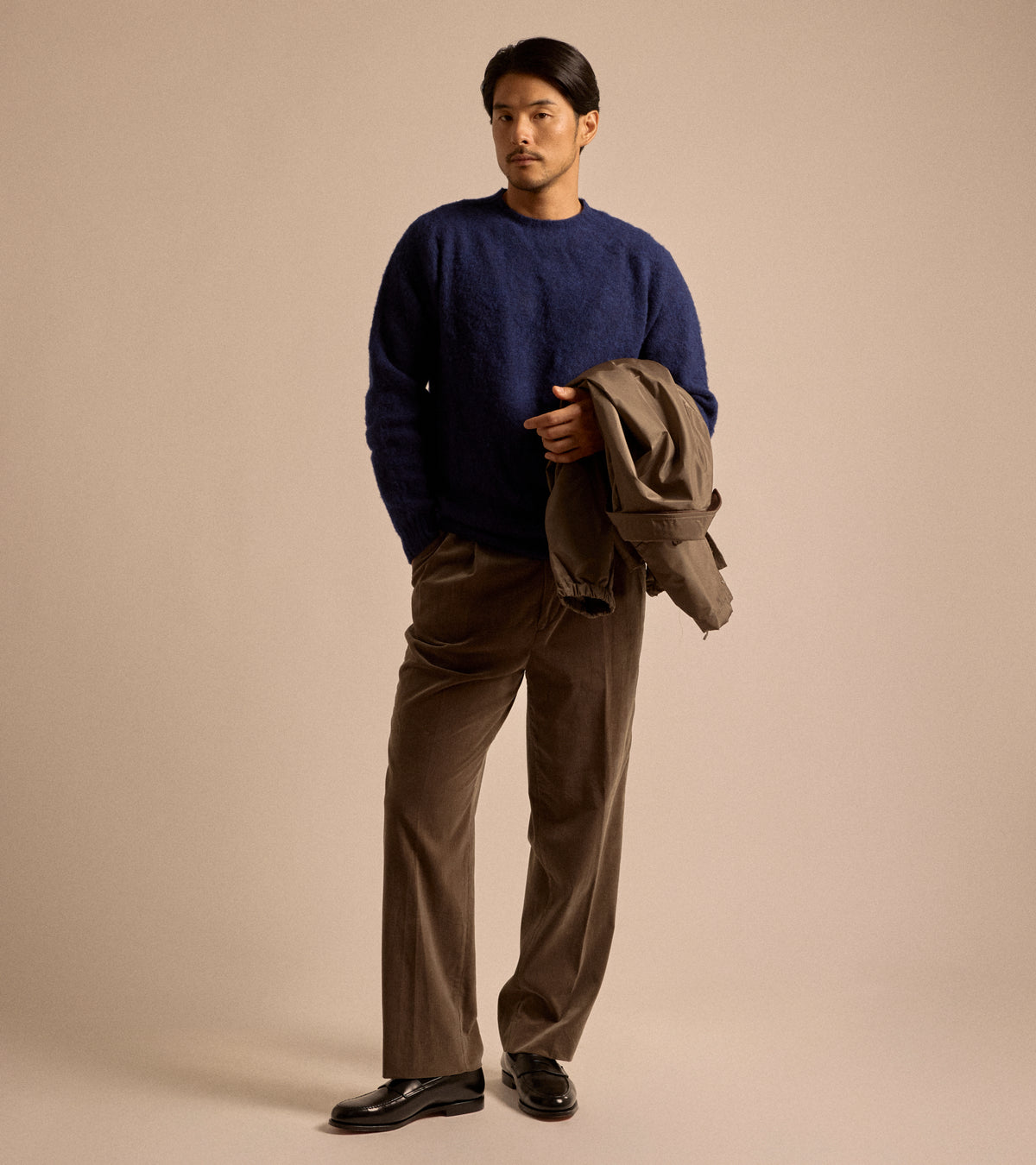 Trunk Goswell Brushed Lambswool Crew Neck Sweater in navy with Kaptain Sunshine Cotton Corduroy Shoecut Slacks in brown, styled shot.